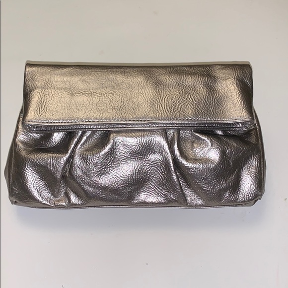 Steve Madden Handbags - EUC Steve Madden Metallic Silver Evening Clutch
